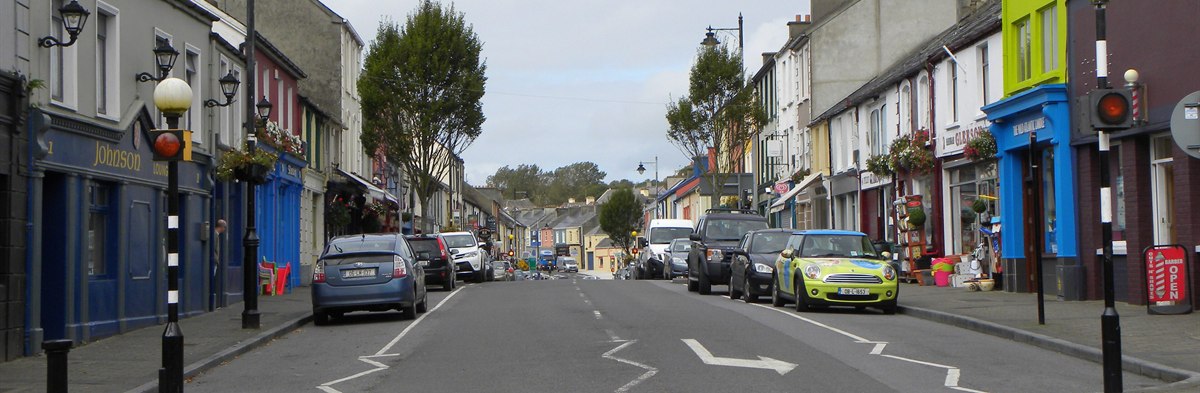 Henry Street in Kilrush, lined with brightly painted shopfronts